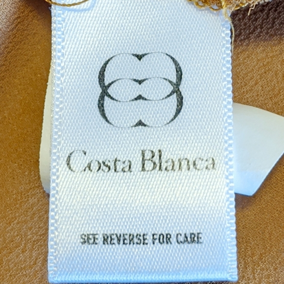 COLLECTION COSTA BLANCA Sheer Asymmetrical Bow Top - Picture 5 of 9